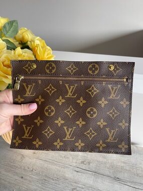 Authentic LOUIS VUITTON Monogram
Pouch insert Toiletry Clutch